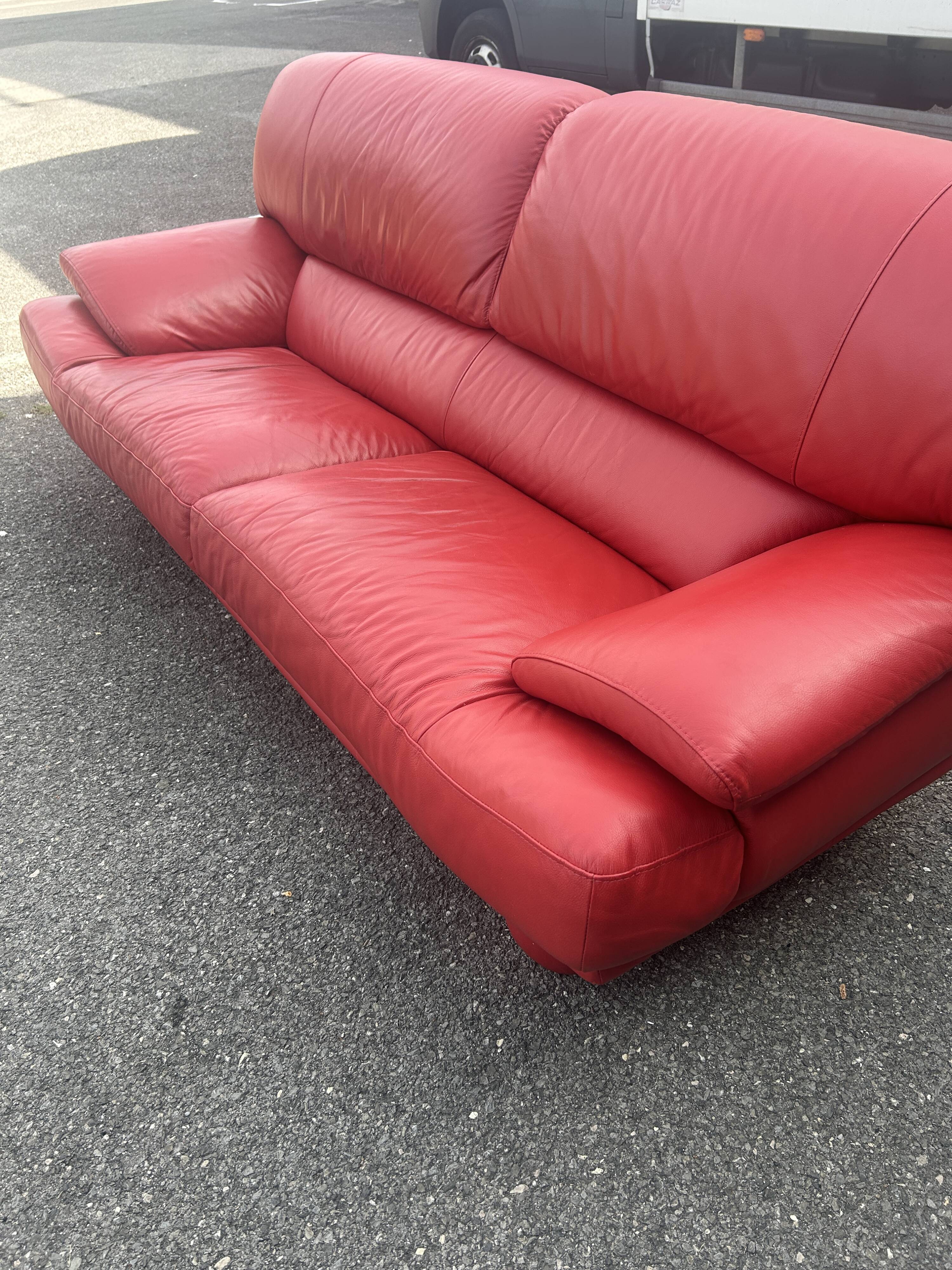 Three-seater red full-grain leather sofa – Vintage Italian design from the years.
