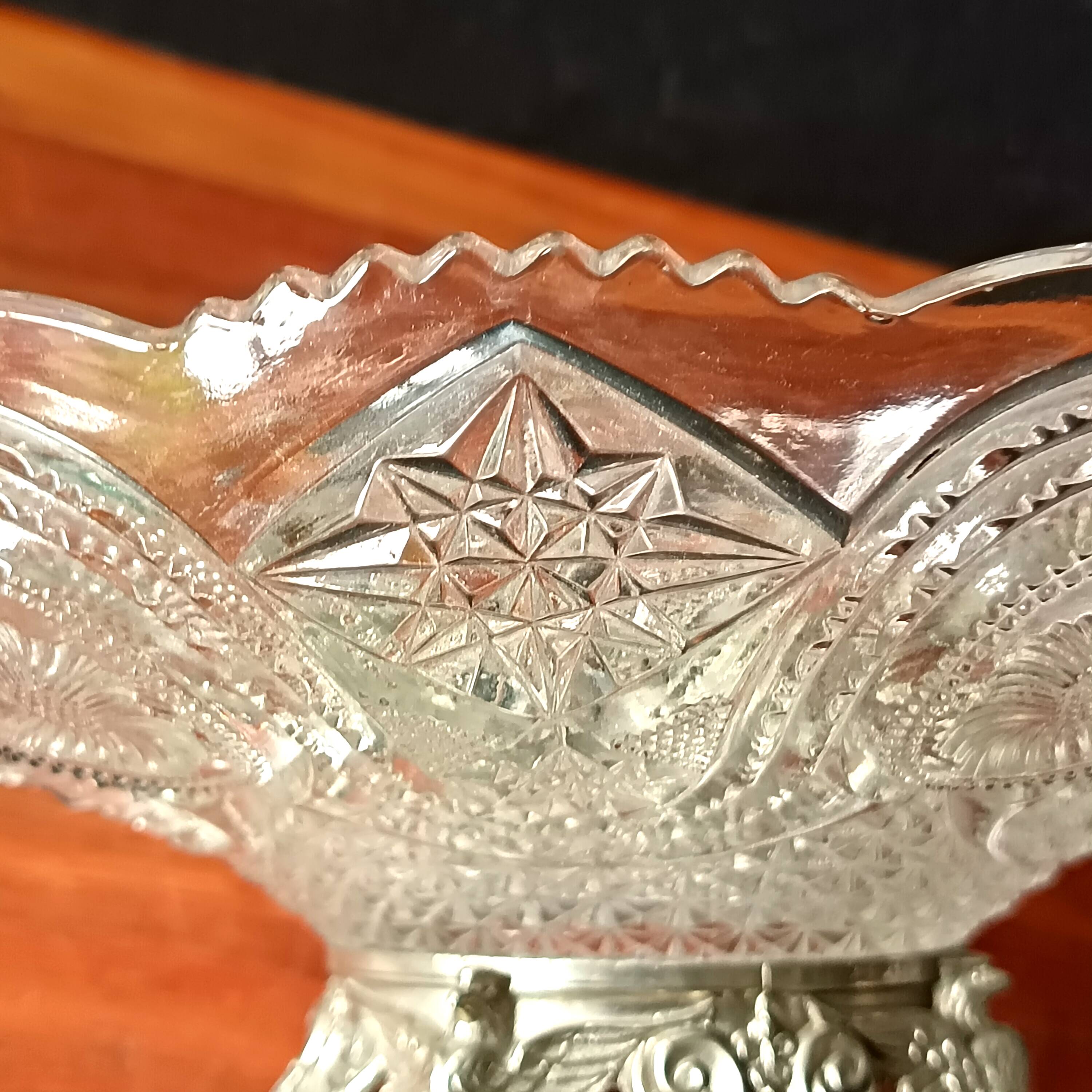 Transparent glass dish on vintage metal stand