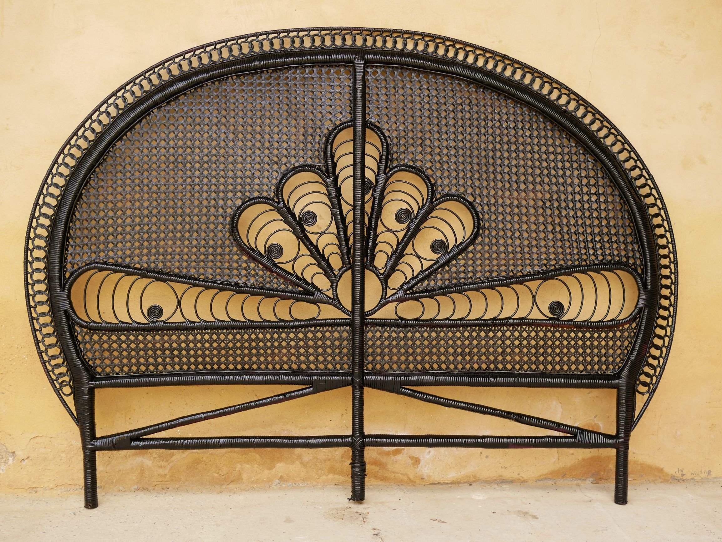 Vintage headboard in black rattan