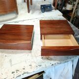 Scandinavian suspended bedside tables in rosewood.