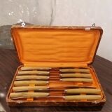 Box of 11 stainless steel knives with bakelite handles