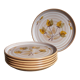 Six assiettes en grès de Niderviller au décor végétal vintages