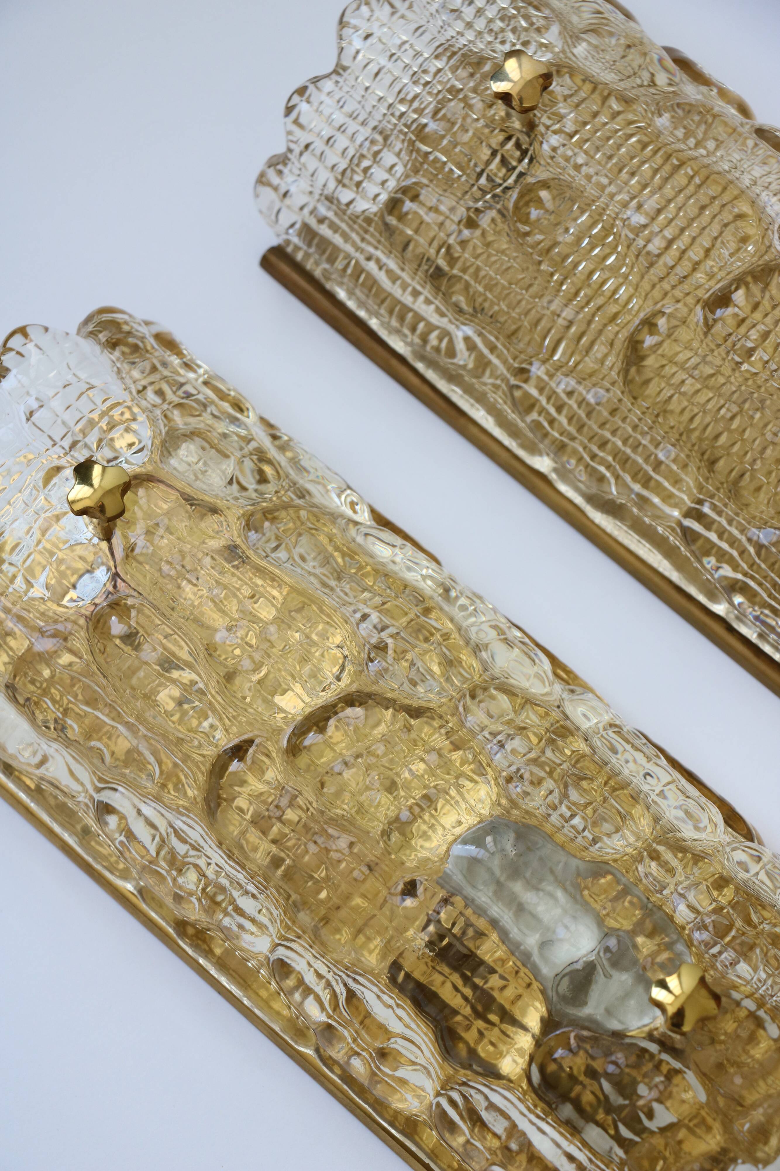 Pair of glass and brass wall lights by Carl Fagerlund for Orrefors, 1960.
