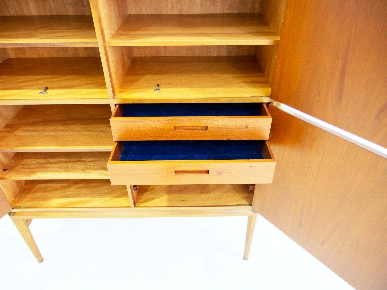 Large Swedish mahogany storage unit with four front doors.