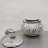 Covered enameled earthenware pot