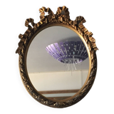 Oval golden mirror
