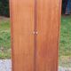 Vintage oak wardrobe with metal legs from the 1950s.