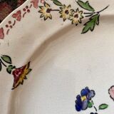 7 hand-painted flowered dinner plates.