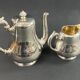 Silver-plated coffee pot and milk jug monogrammed MA, signed CHRISTOFLE.