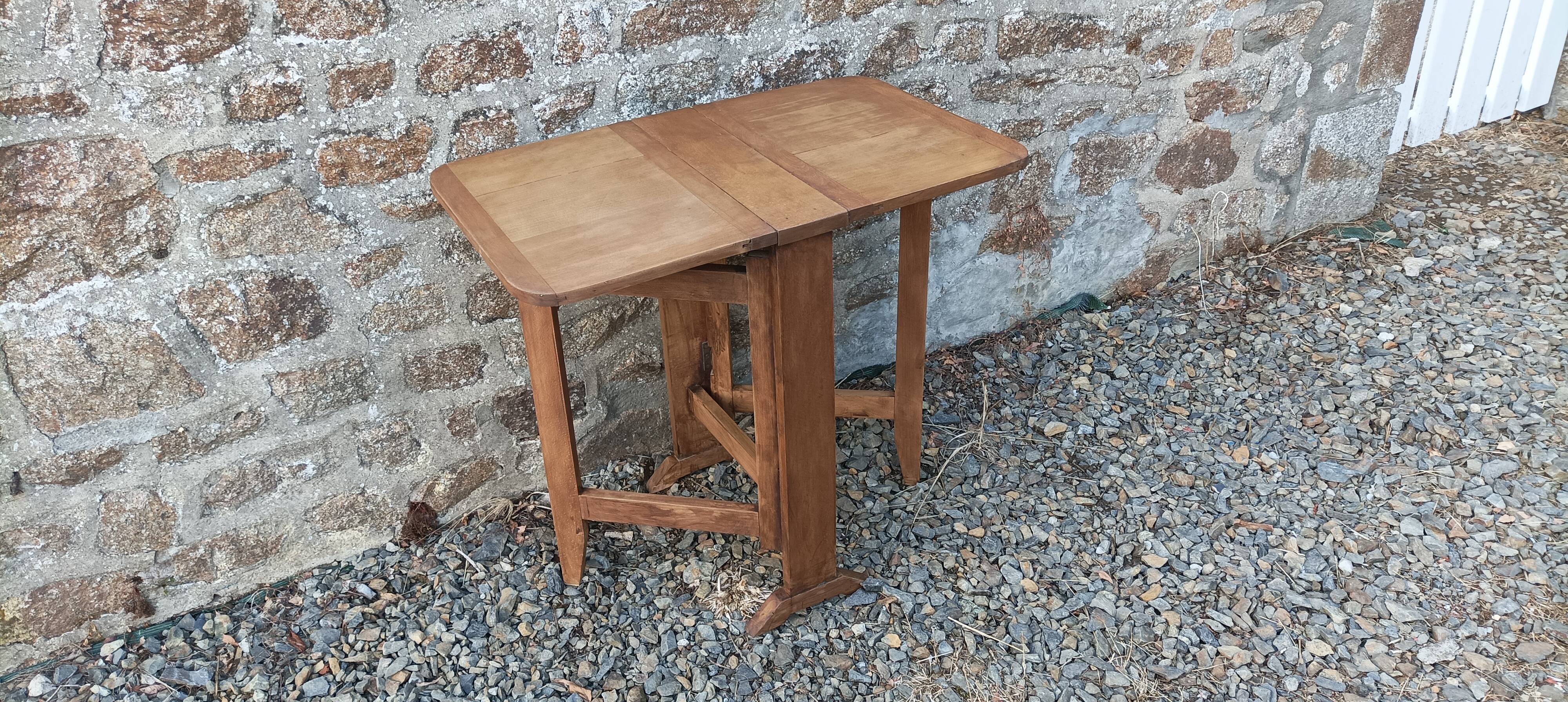 Old wooden table with double swings