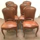 Suite de six chaises en noyer avec assises cuir, style Louis XV