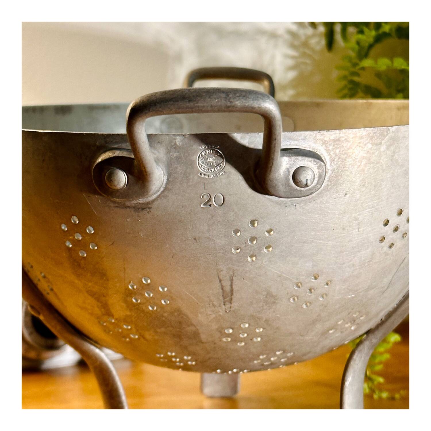 Old aluminum colander