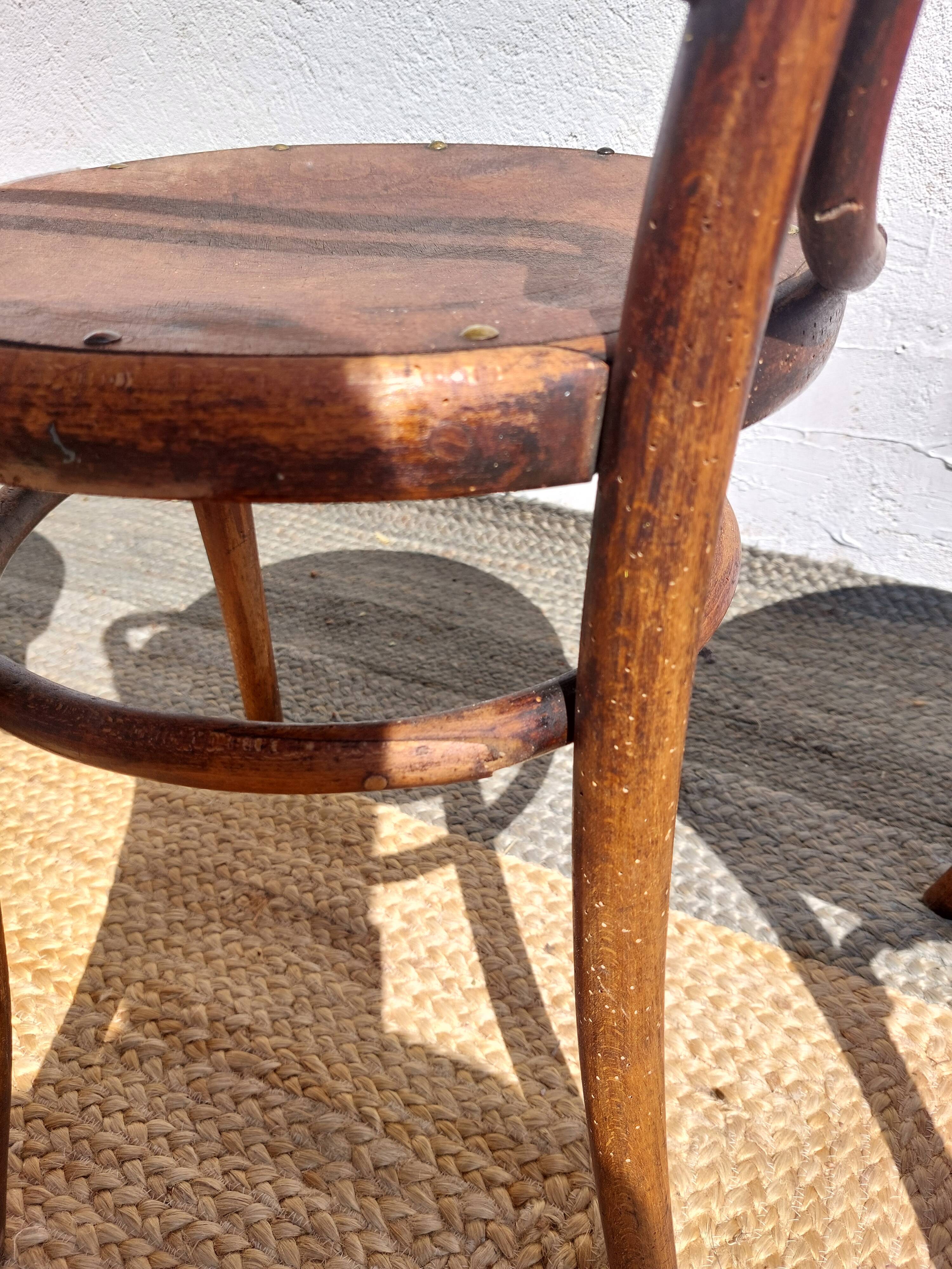 4 curved wooden bistro chairs