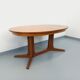 Vintage oval dining table Baumann from the 60s and 70s in teak with extension.