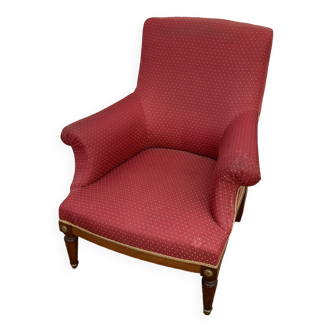 Antique upholstered armchair