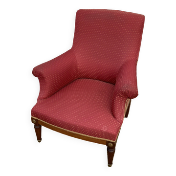 Antique upholstered armchair