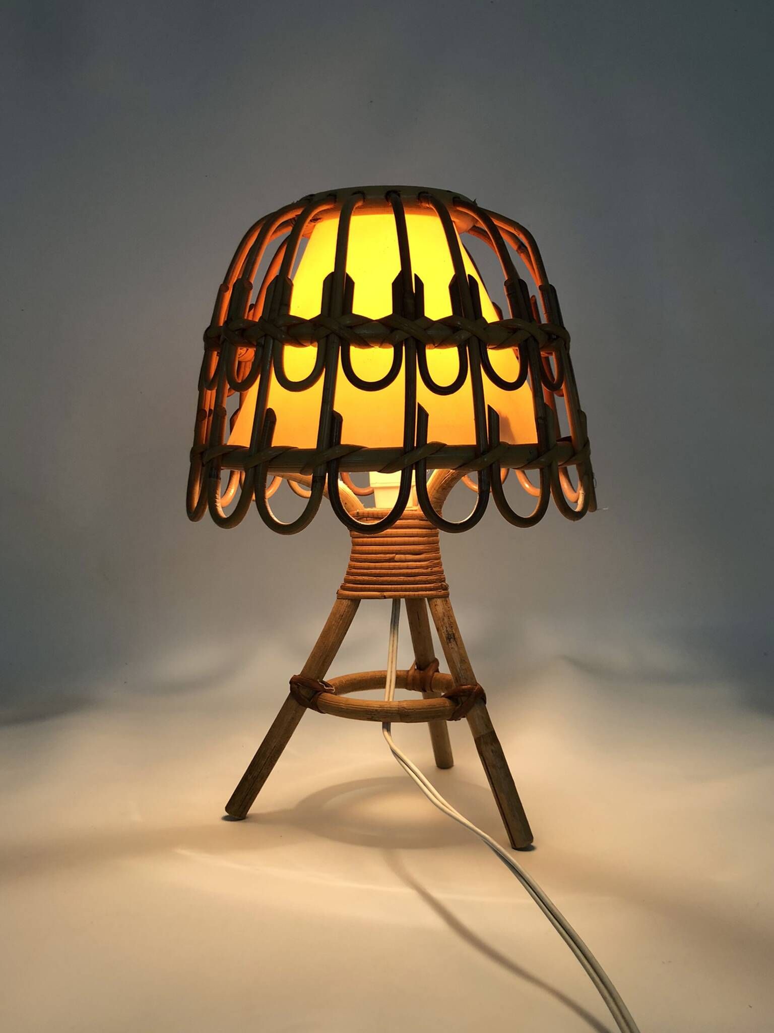 Rattan lamp in the style of Louis Sognot from the 1950s.