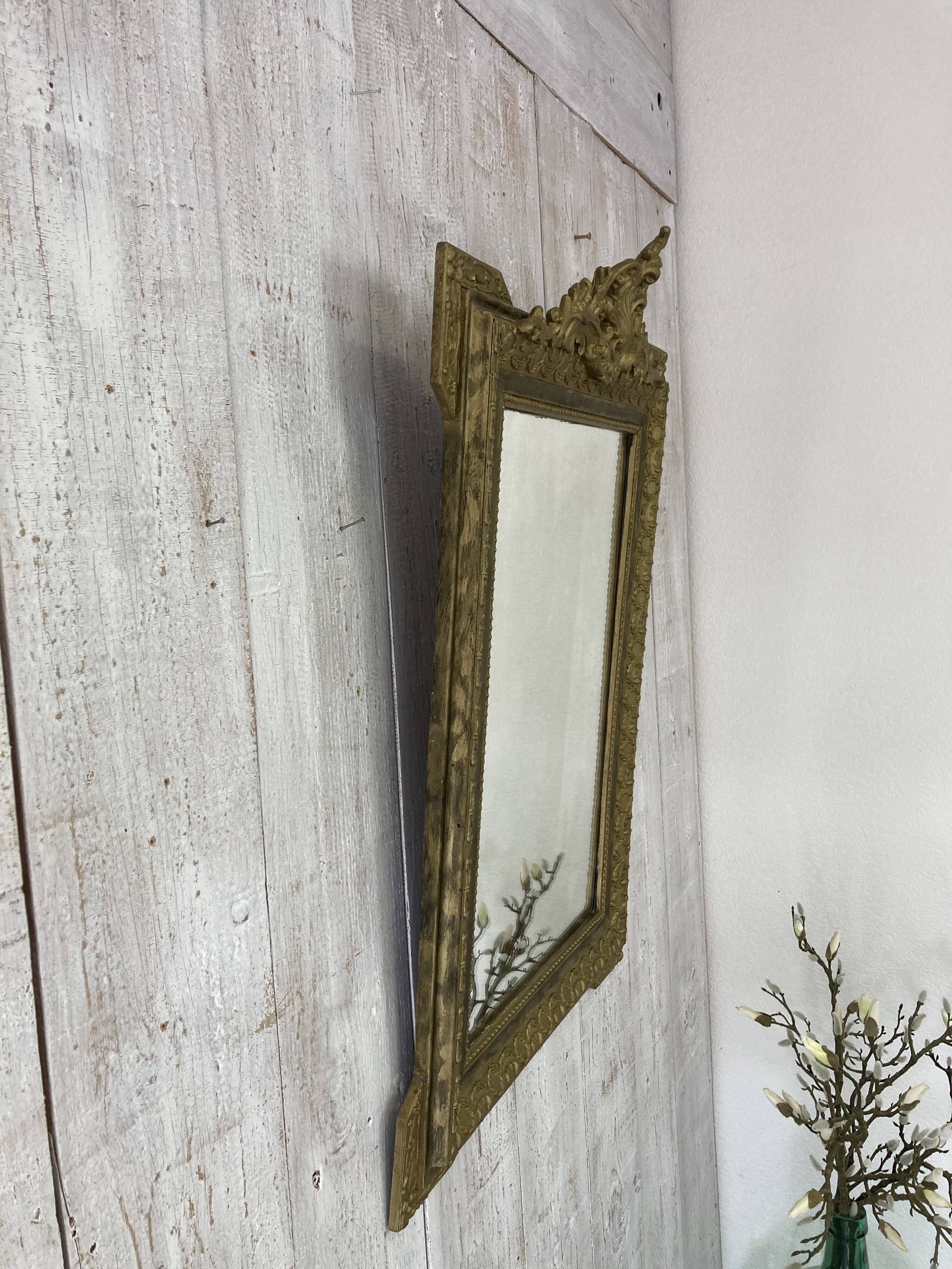 Antique mirror with a pediment