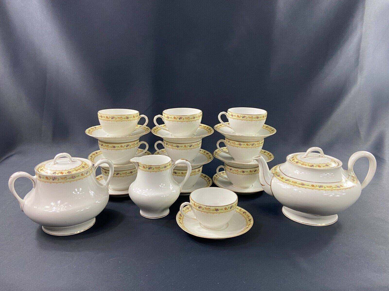 Limoges porcelain tea set Bernardaud Teapot sugar bowl milk pot cups