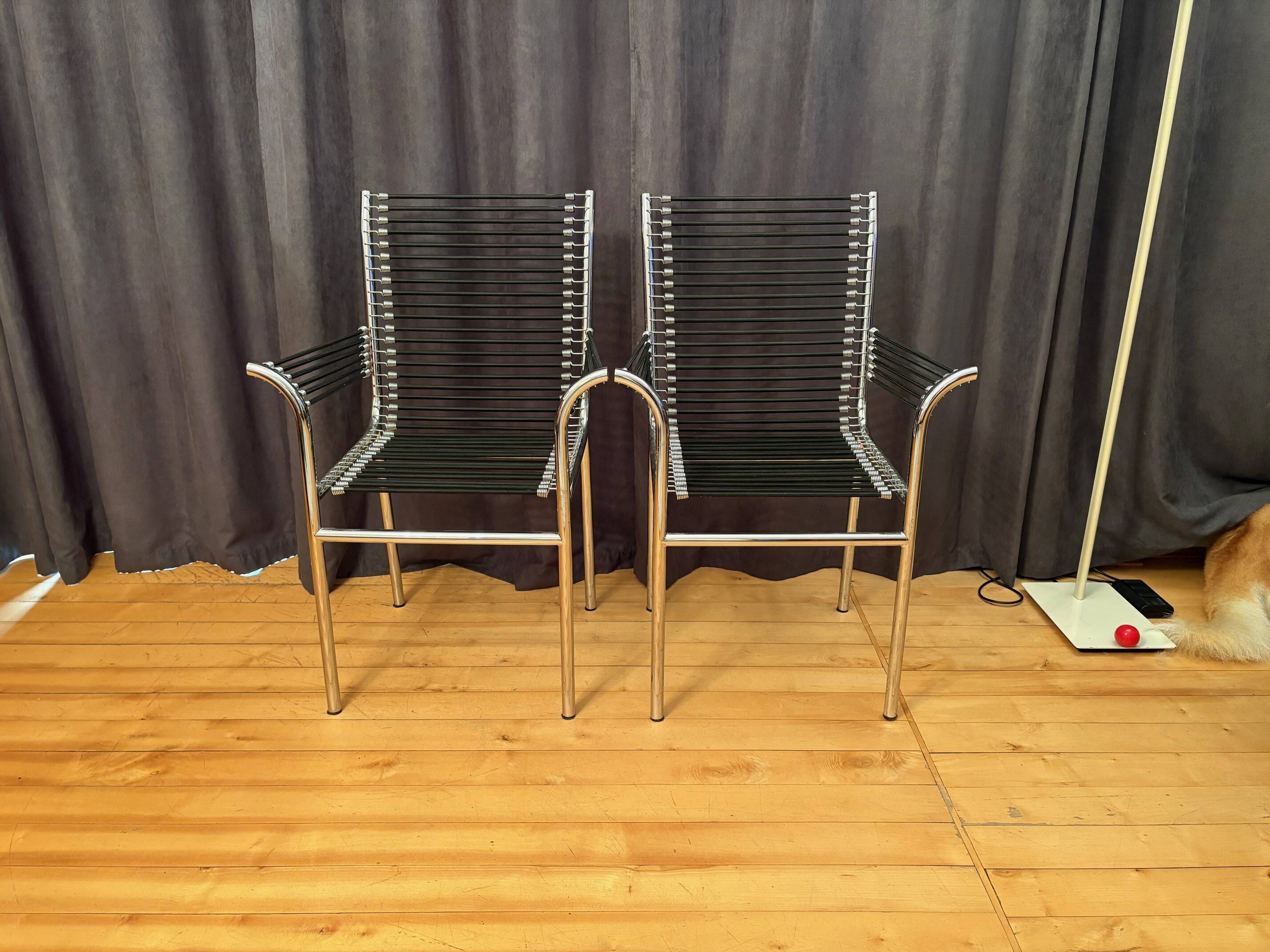 Pair of "Sandows" chairs designed by Rene Herbst, Bauhaus, France, 1980s