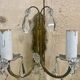 Pair of bronze sconces and pendants from the early 20th century