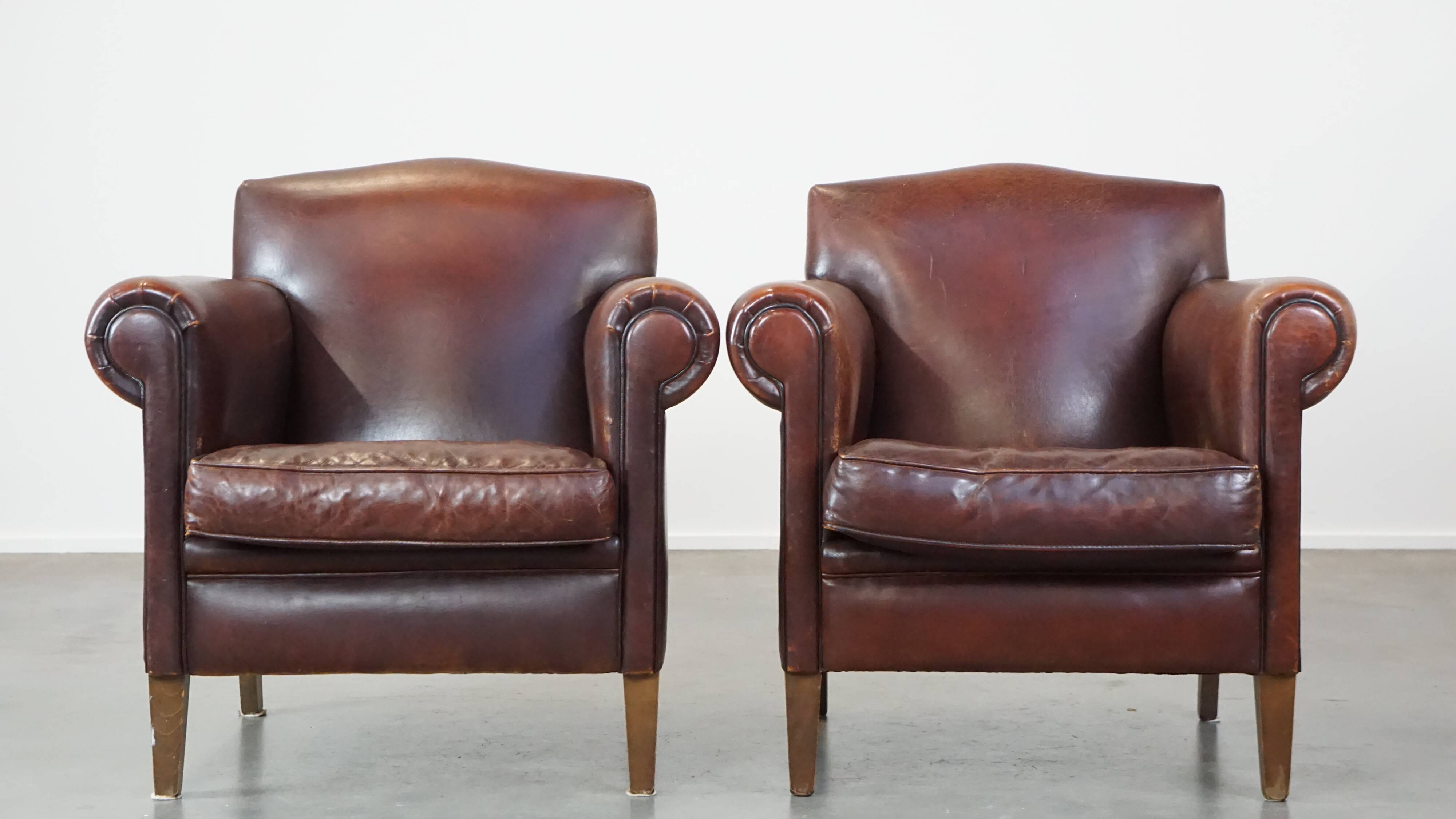 Set of 2 design armchairs made of sheepskin