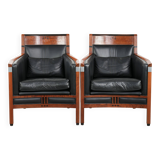 Set of 2 black leather Art Deco design armchairs in good condition