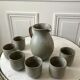 Service pitcher and its 6 matching cups of vintage sandstone