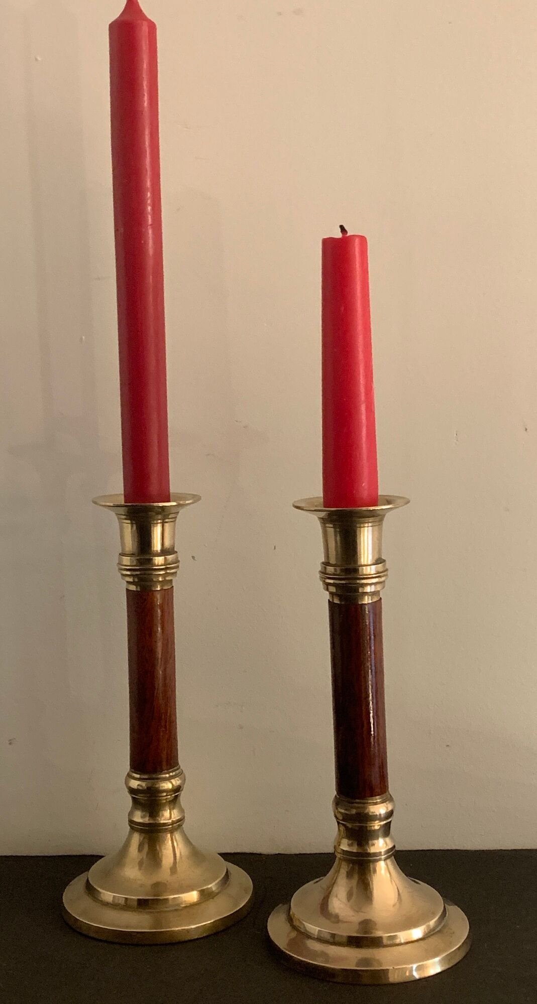 Pair of brass and mahogany wood candle holders