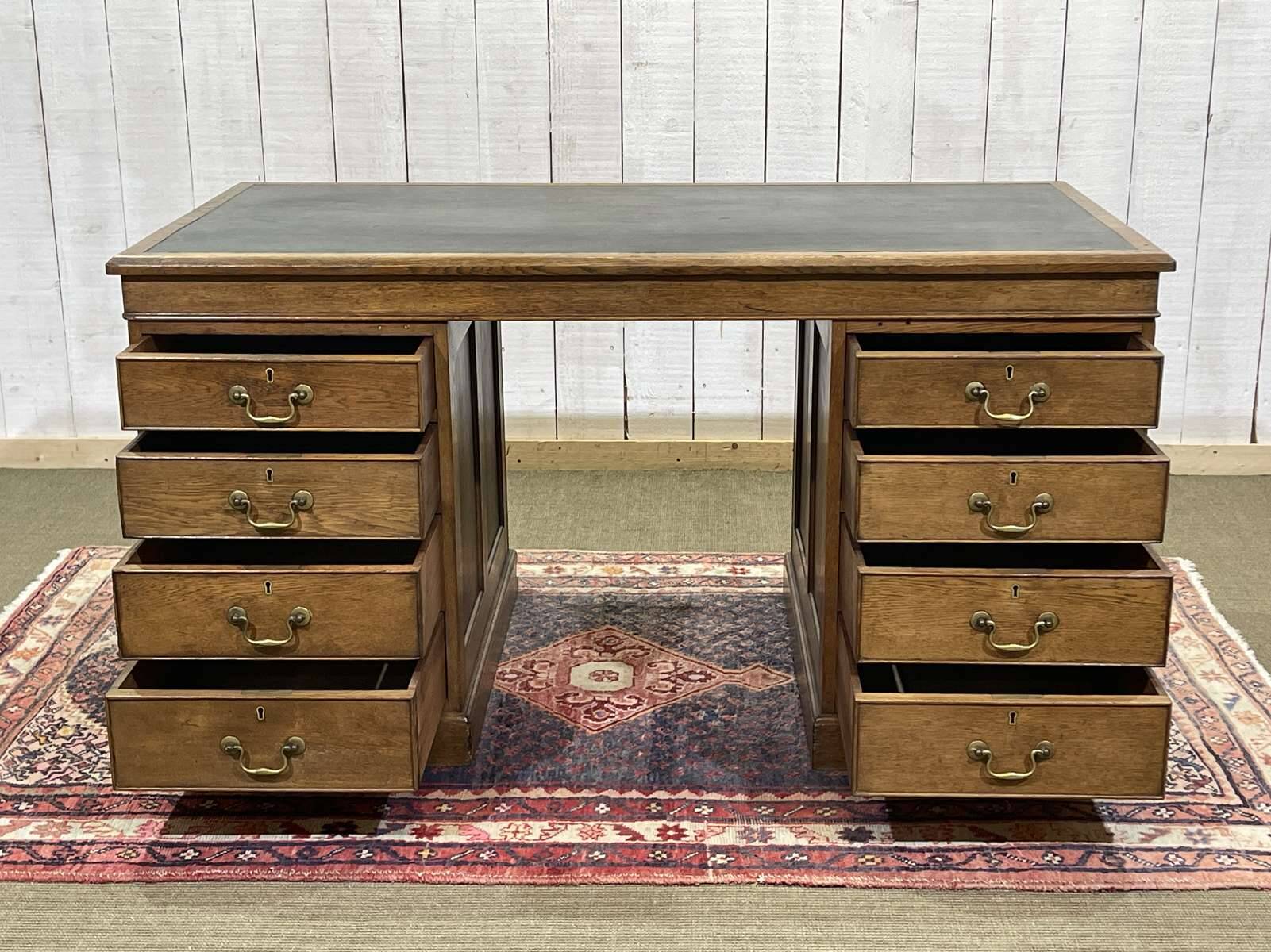 Early 20th century English flat desk in oak