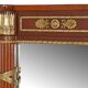 Console topped with an Empire-style mirror.