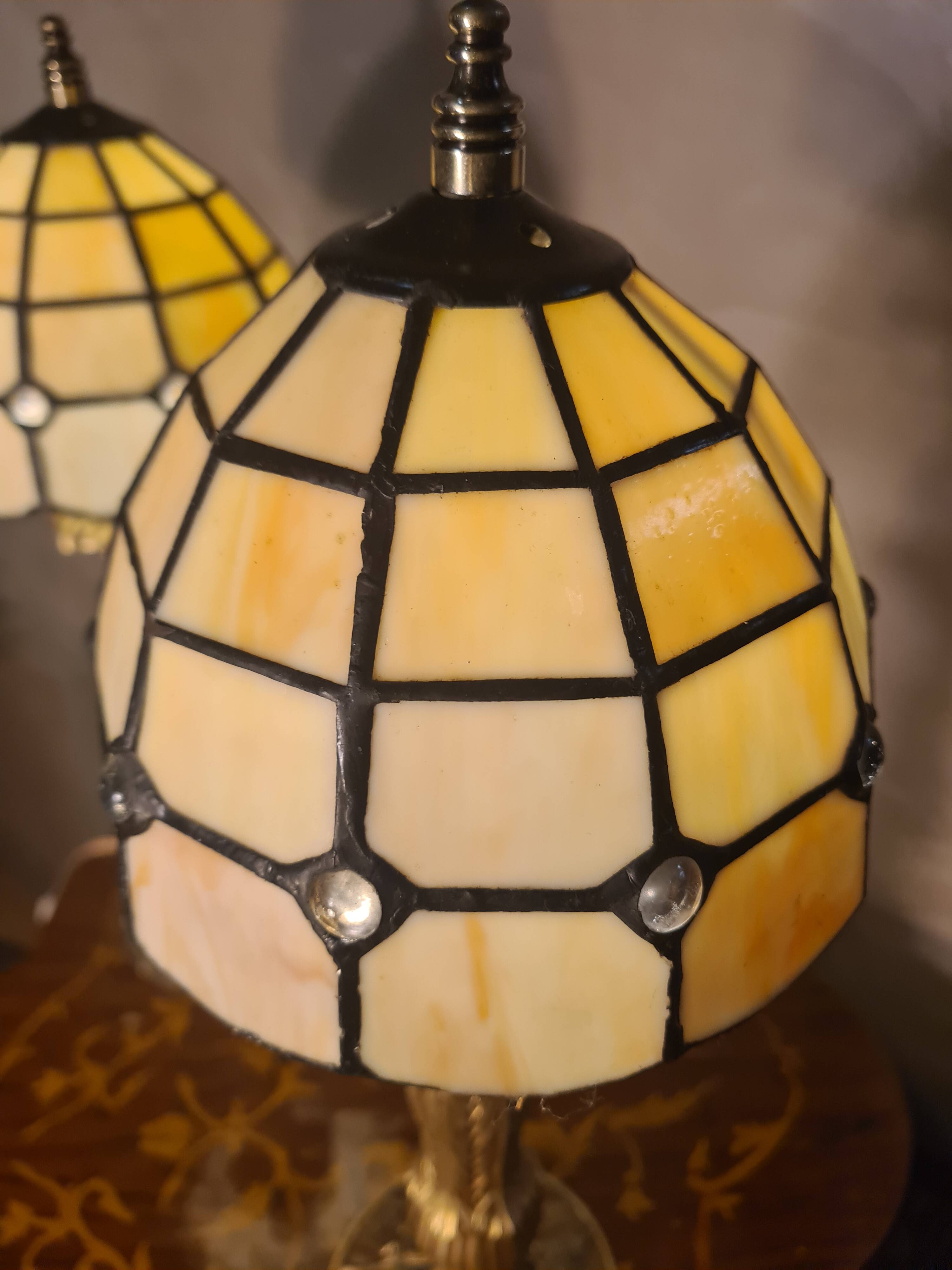 pair of bedside lamps in gilded bronze with glass shade