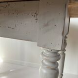Round wooden table with flaps