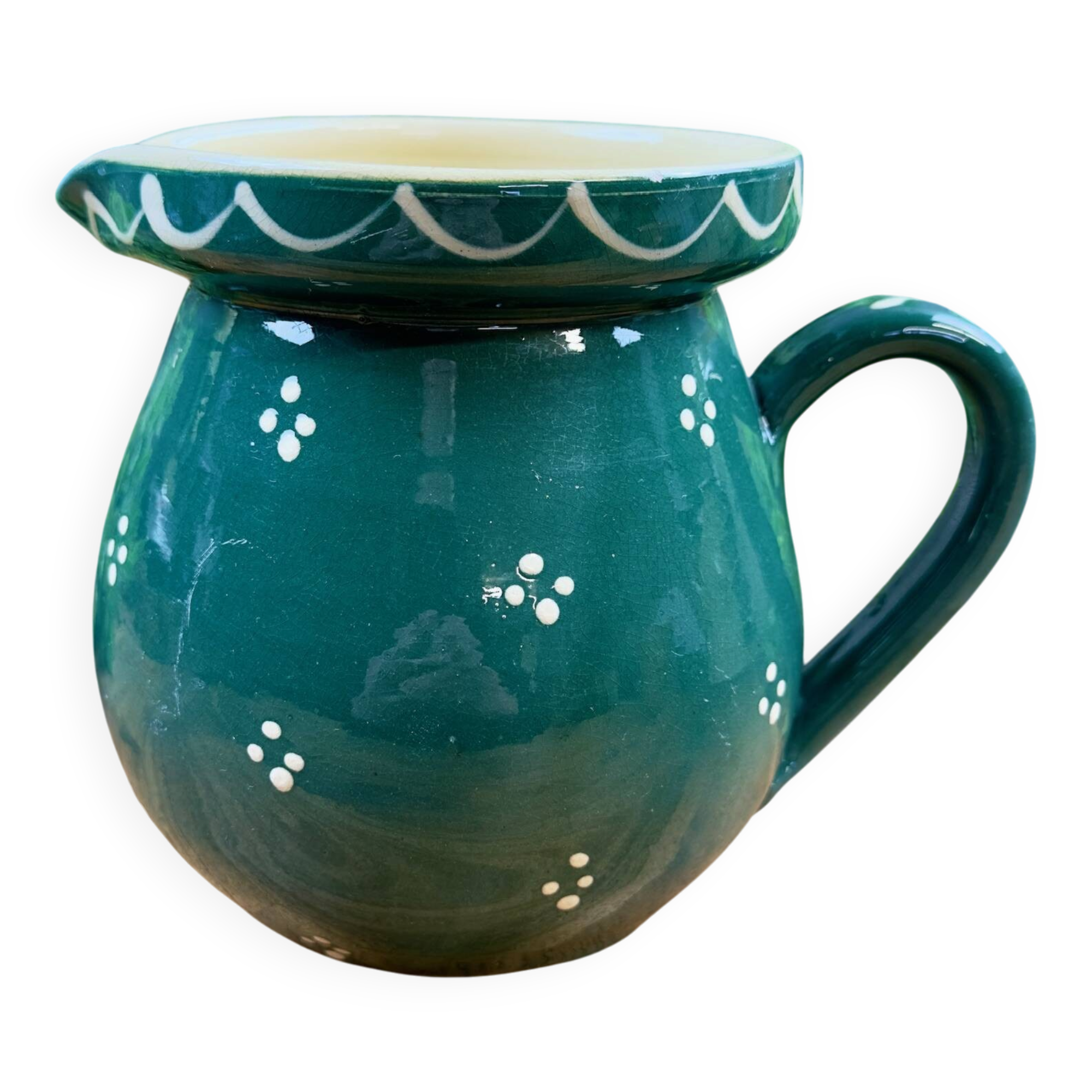 Green glazed ceramic jug