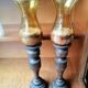 Pair of wooden candle holders and antique glass