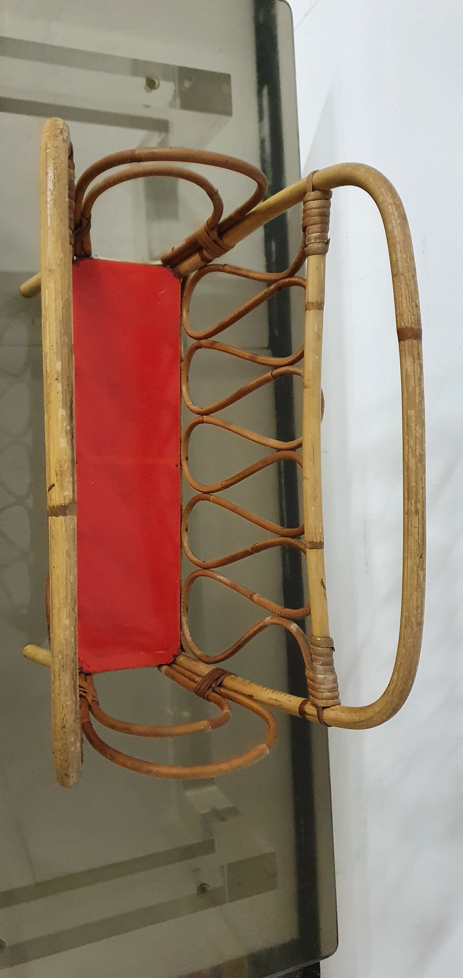 Magazine door in rattan and formica