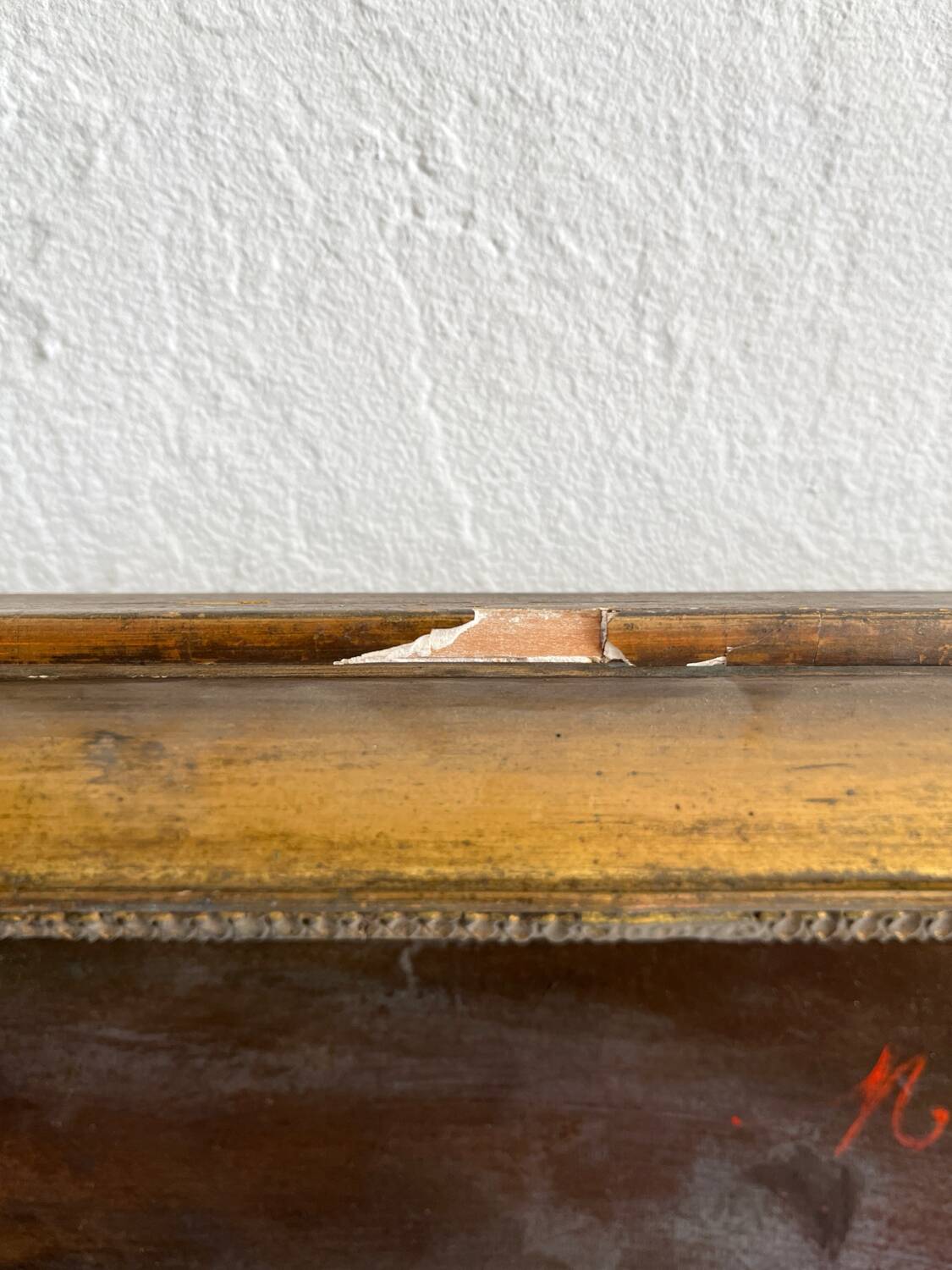 Old oil painting on canvas portrait of a woman with a red bow, late 19th century