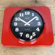 Vintage red bakelite wall clock from prim, 1970s