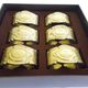 Six rounds of brass towel in their original box 1960  Art Deco