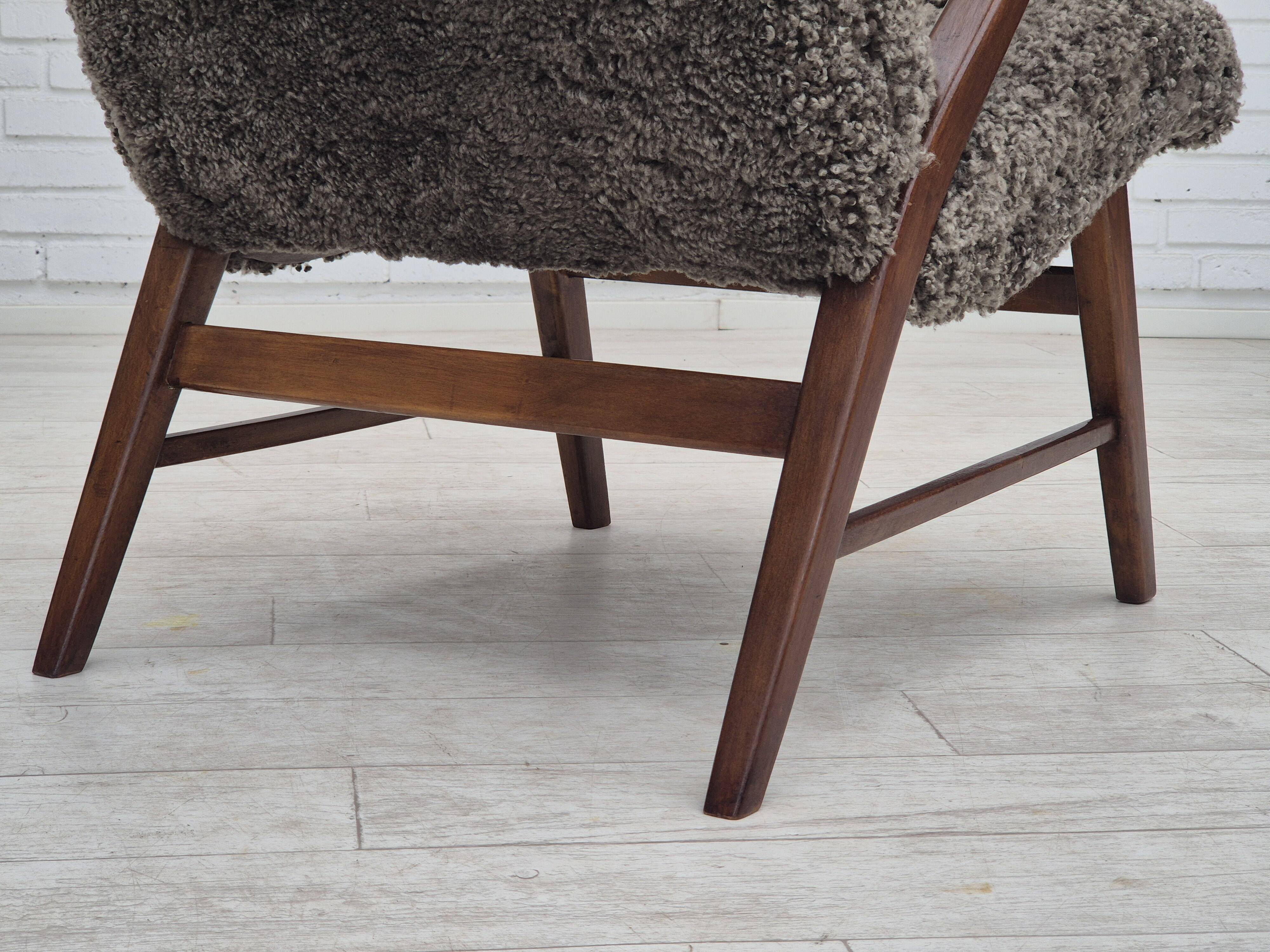 60s, Danish design, refurbished armchair, genuine sheepskin "Wellington".