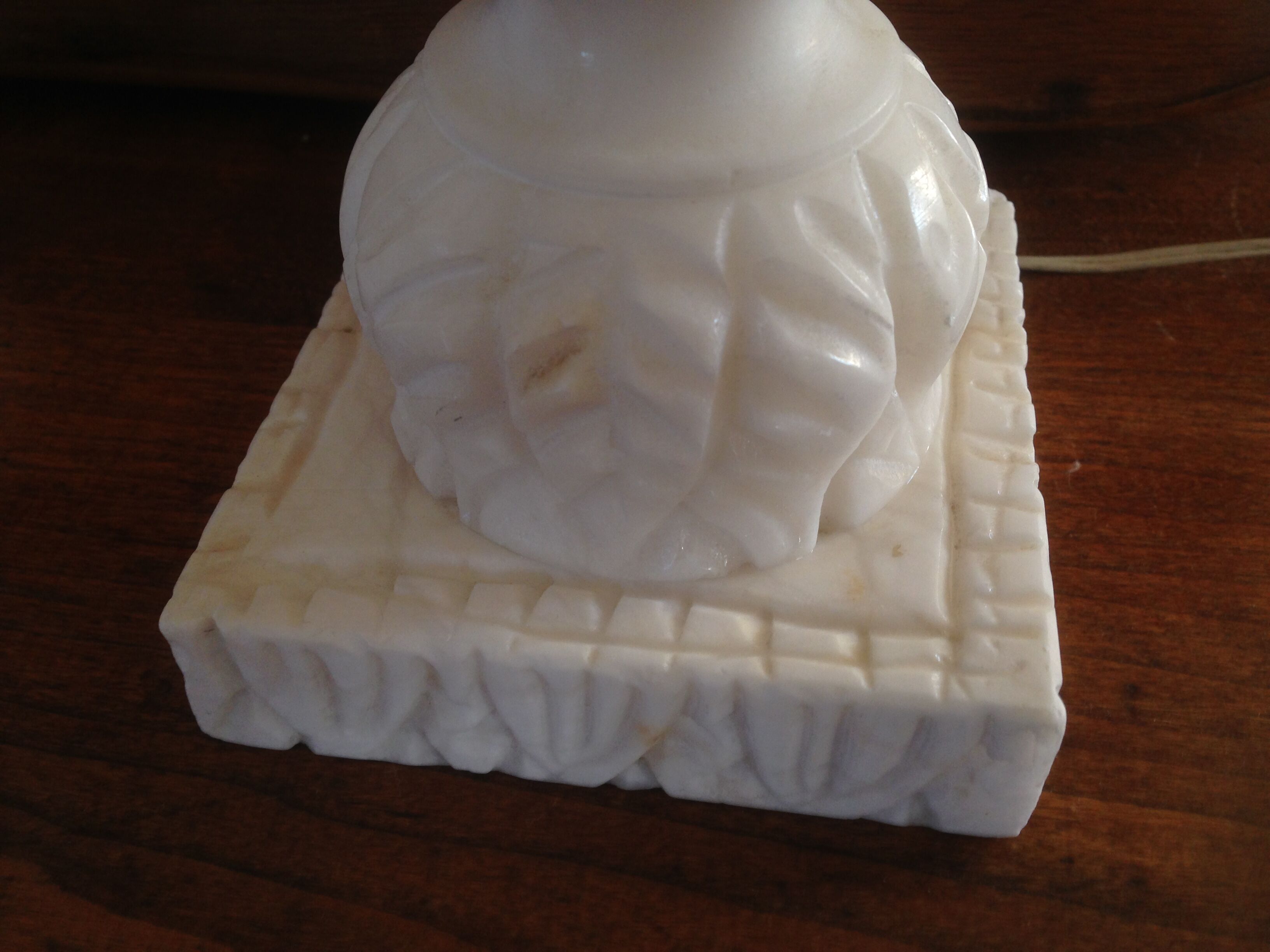 Feet of carved Alabaster column lamp