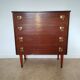Chest of drawers with spindle legs