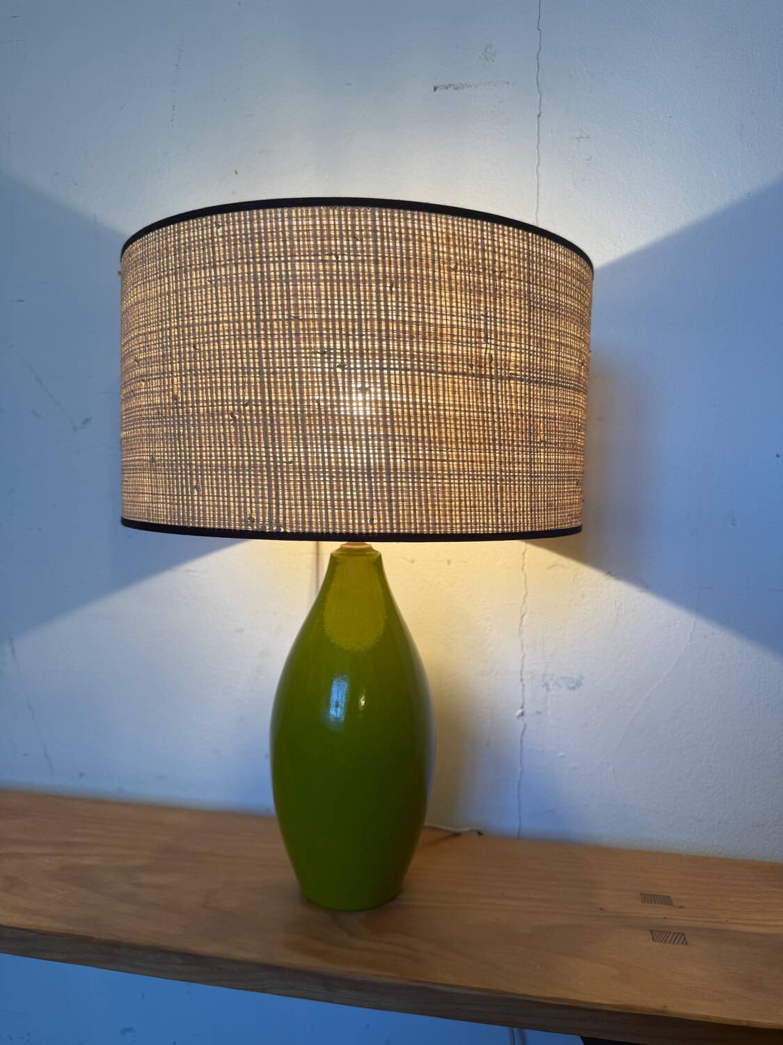 Vintage green glazed ceramic lamp and cane shade