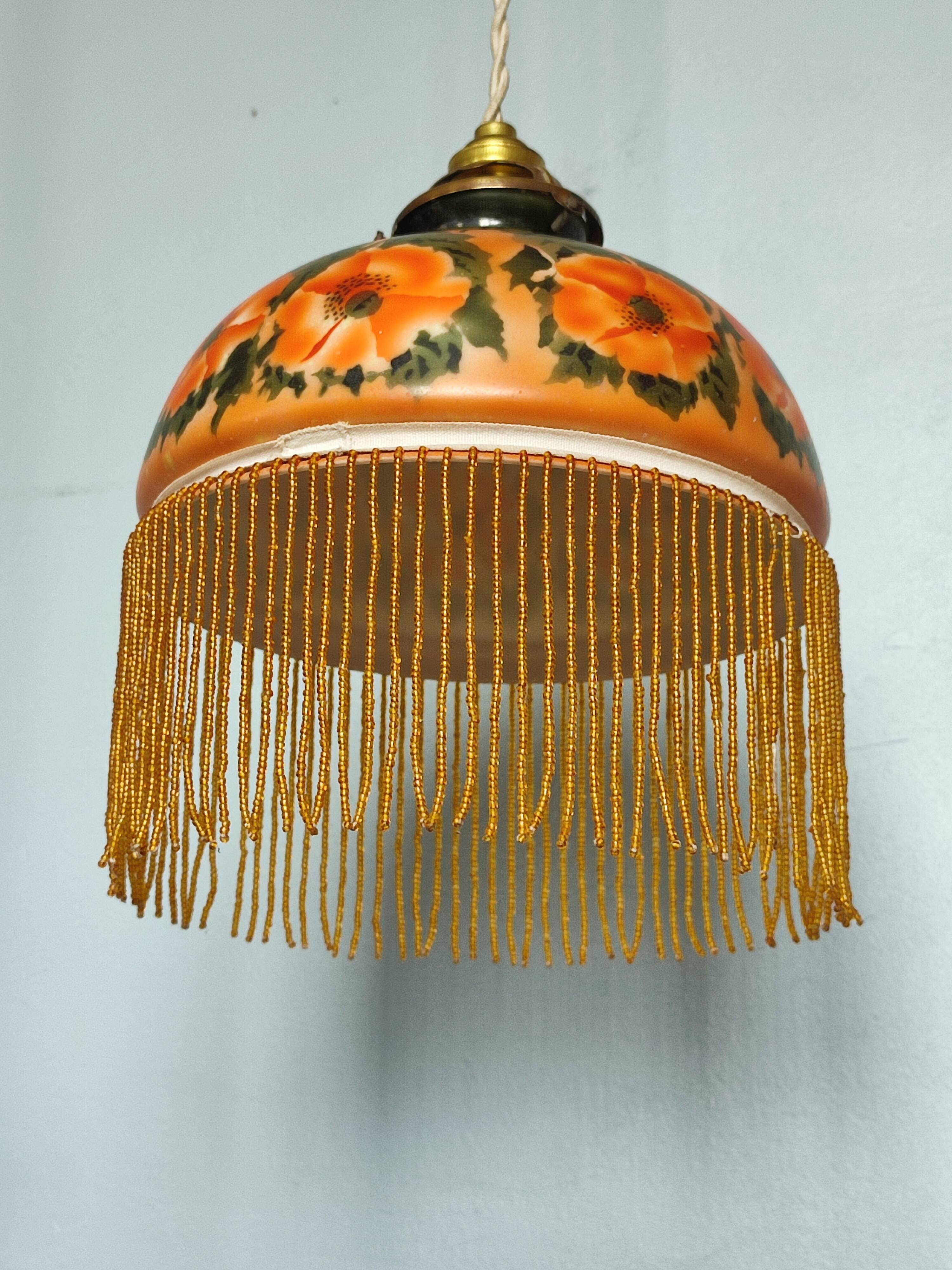Old opaline and its tassels hanging lamp