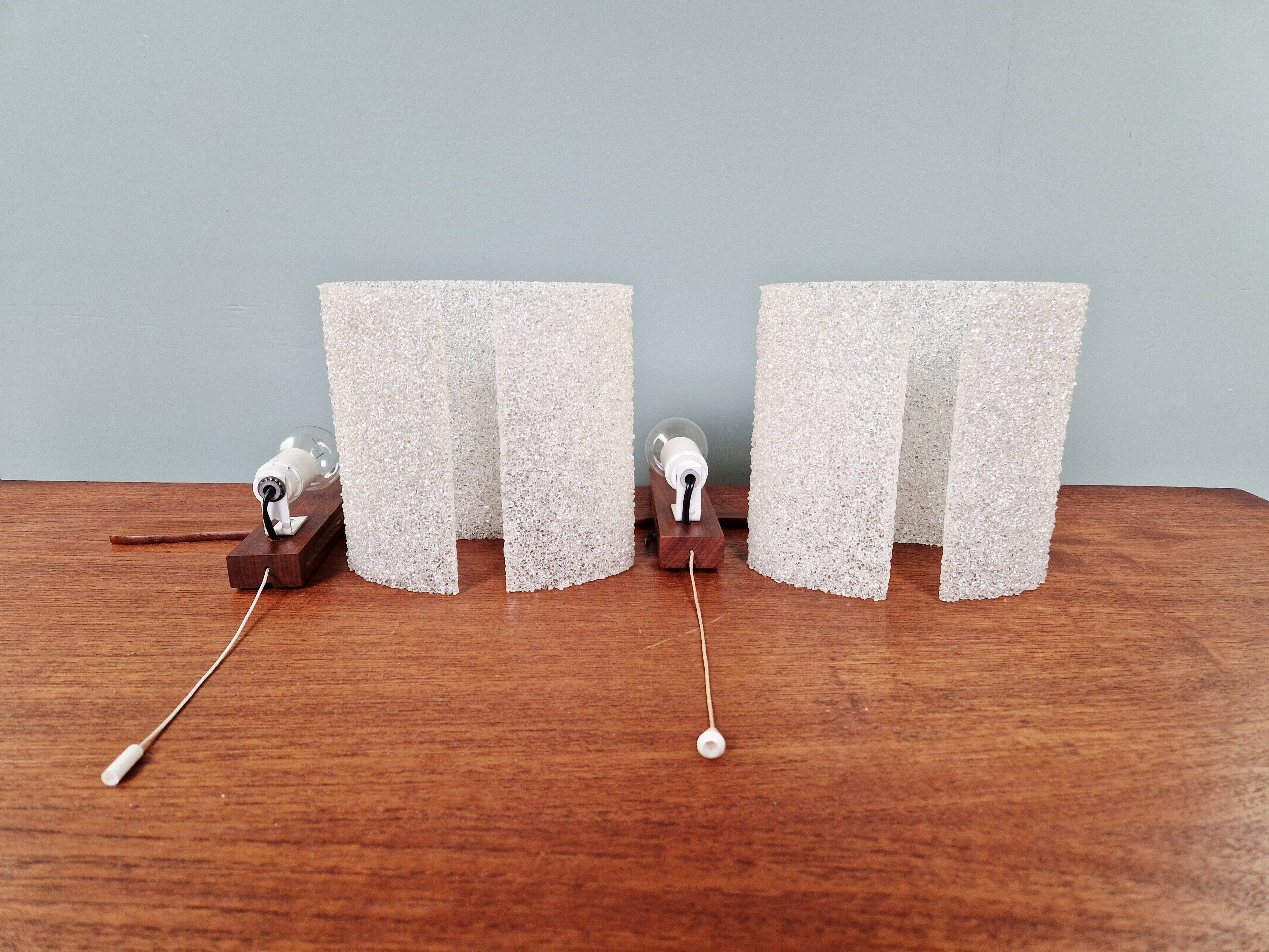Pair of Scandinavian wall sconces in teak and plastic resin, 1960.