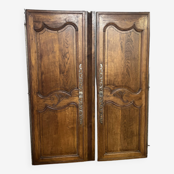 Pair of old cabinet doors and its crosspiece