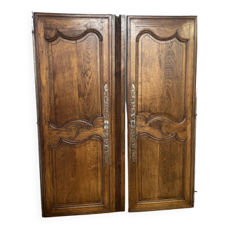 Pair of old cabinet doors and its crosspiece