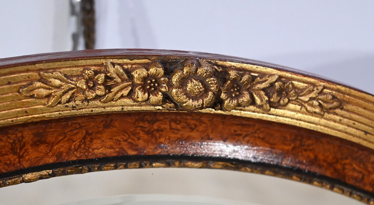 Oval mirror in gilded wood – early twentieth century