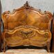 Center bed Louis XV rocaille of curved shape in walnut