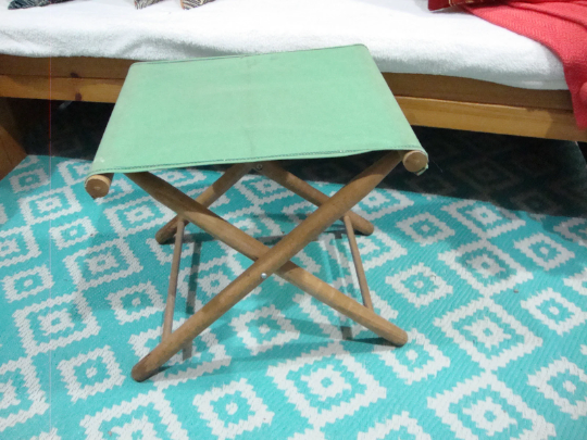 Folding wooden and canvas stool